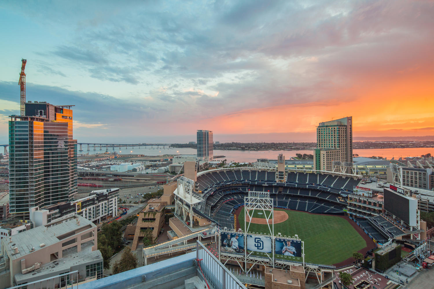 Sunset over Petco Park and the East Village skyline in downtown San Diego